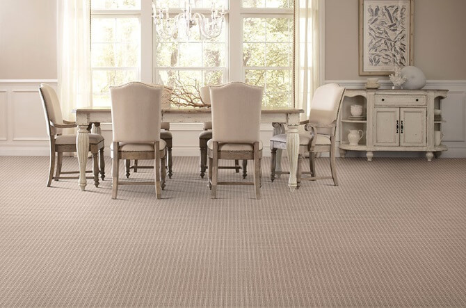 dining area with light colored carpet